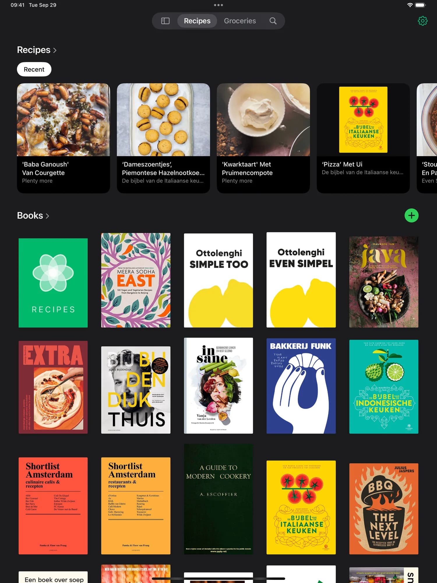 The CookCook library on iPad, with recent recipes above a grid of cookbook covers
