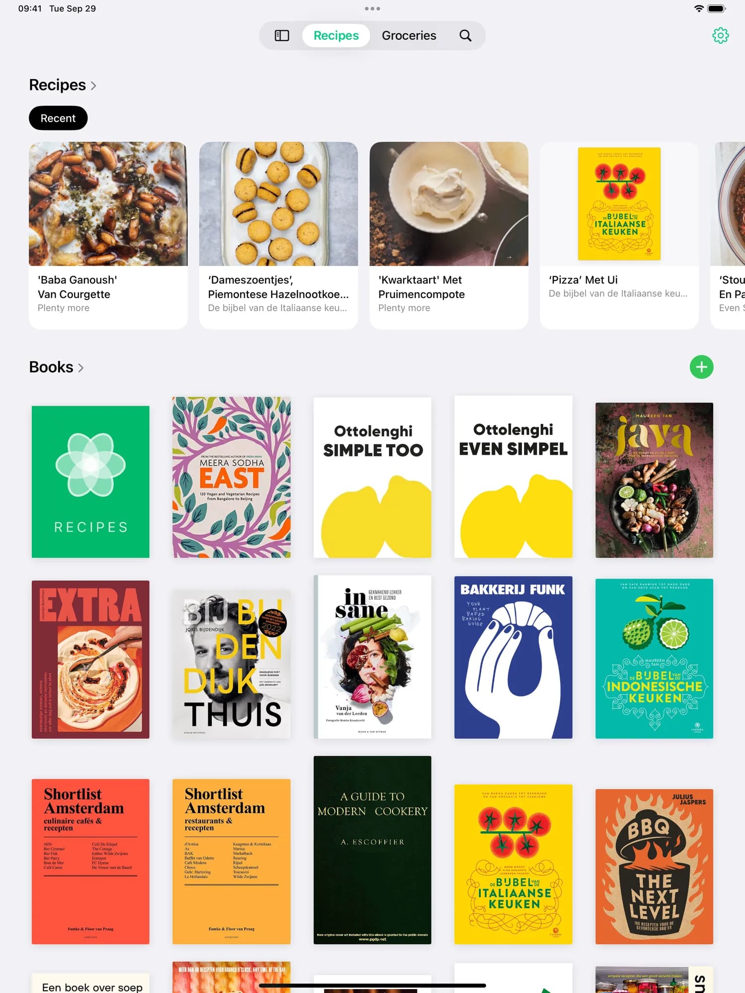 The CookCook library on iPad, with recent recipes above a grid of cookbook covers